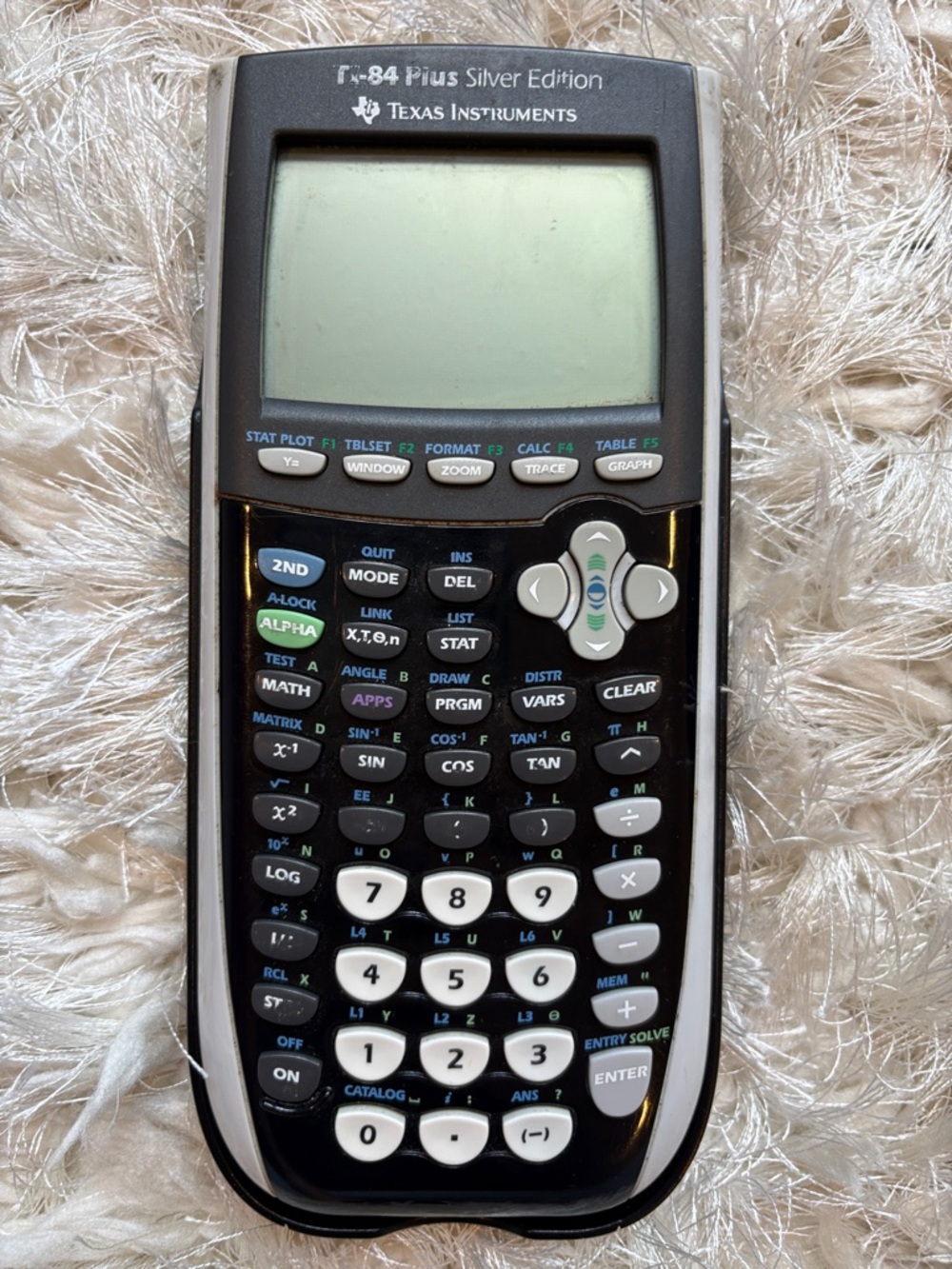 TI-84 Plus Silver Edition Graphing Calculator in Black and Silver